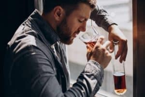 man drinker depressed with bottle whiskey 1303 28170